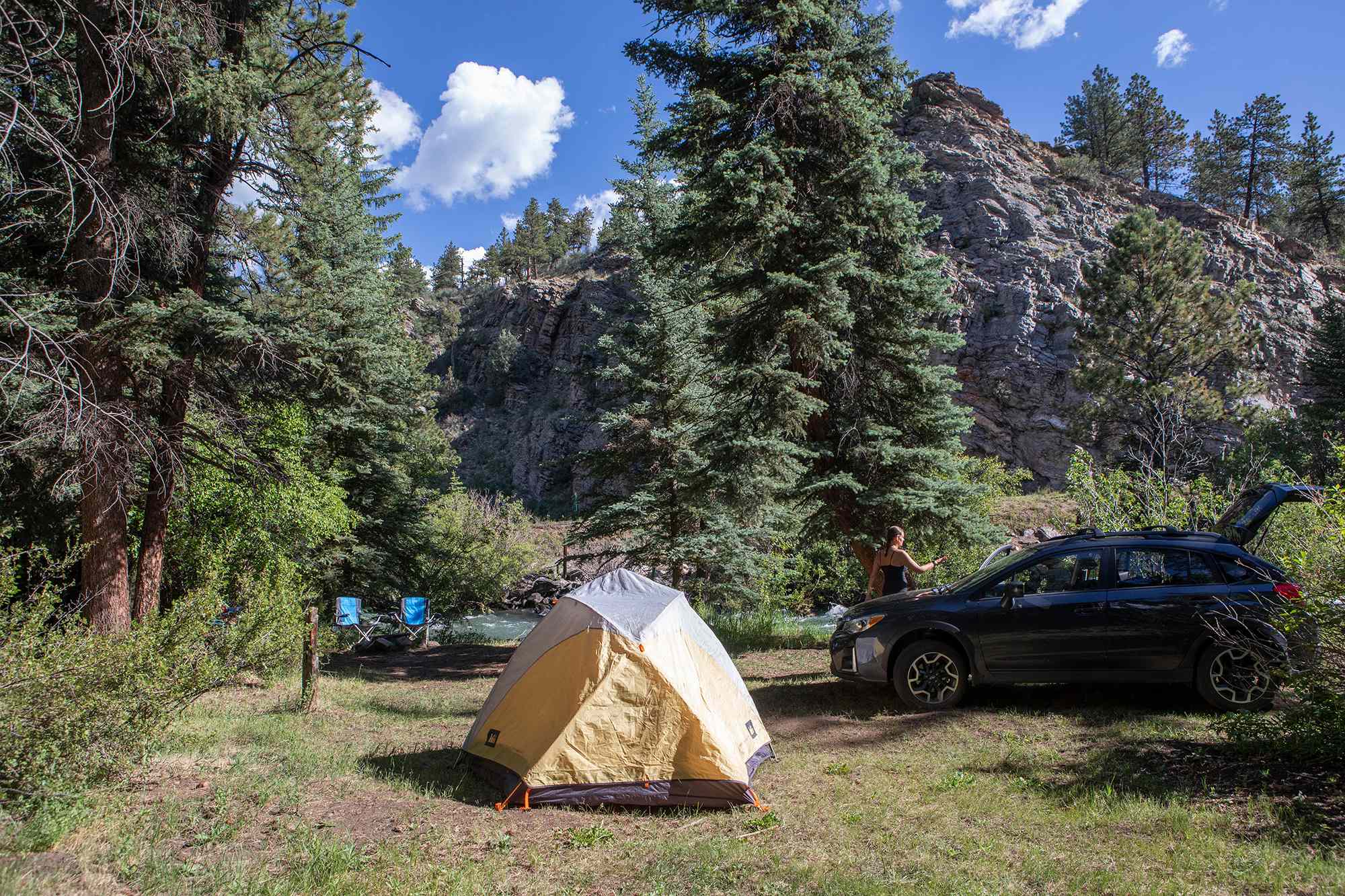 Our campsite down by the river facing a gorgeous, rugged rock face.