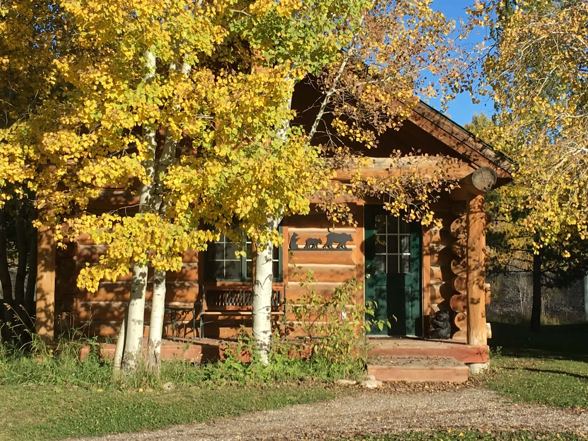 Exterior of log cabin. 
