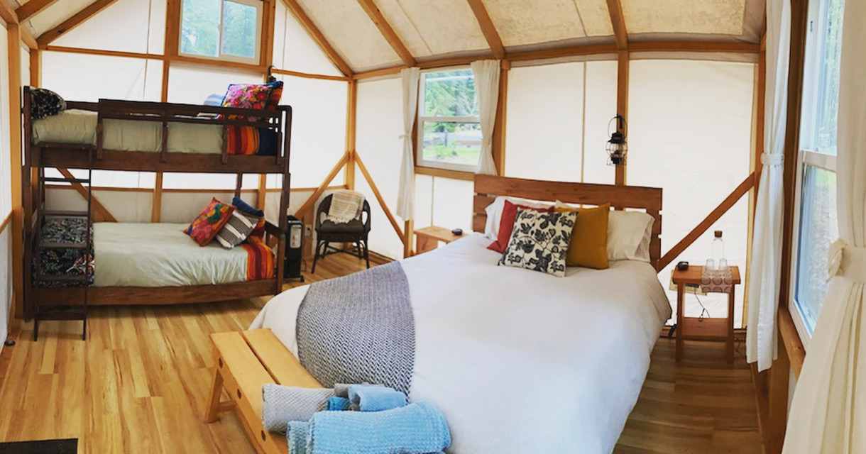 Cabin 5 is the largest of our cabins with a queen and bunked twins. It’s also taller than the others. 