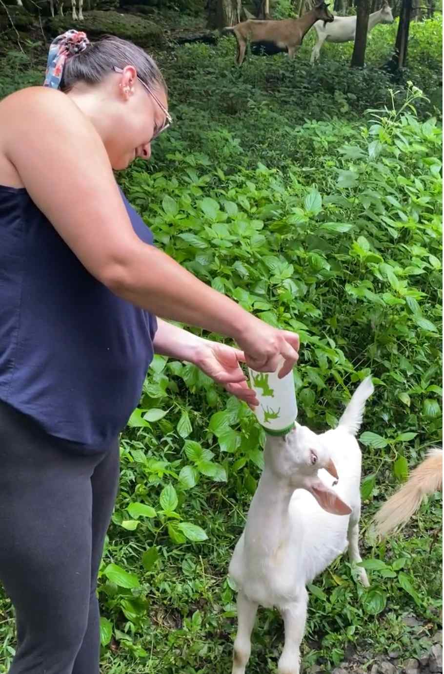 Hip camper, Jillian, bottle feeding baby Chudo