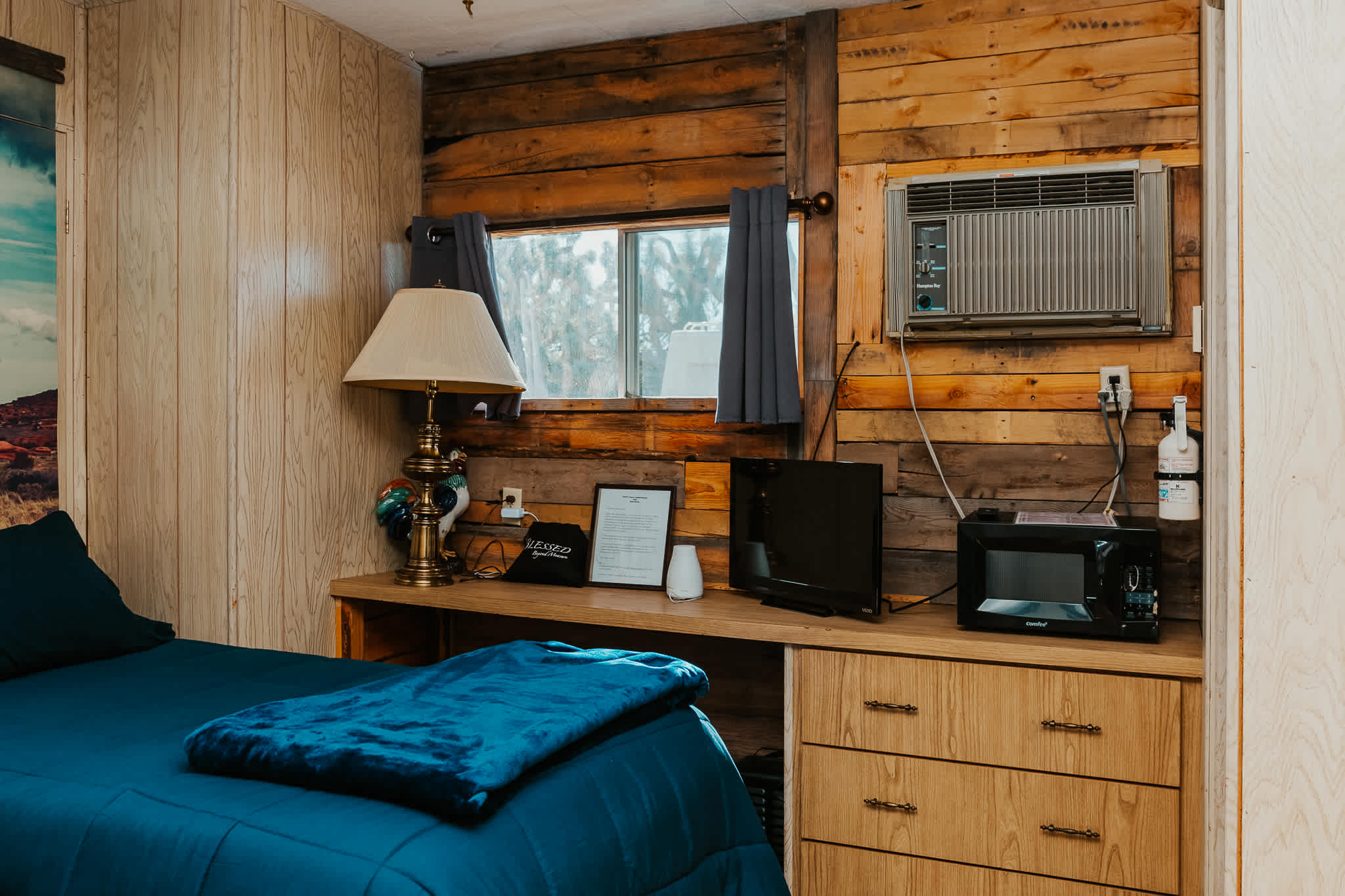 Small desk for working, drawers, tv with cable, microwave and mini fridge
