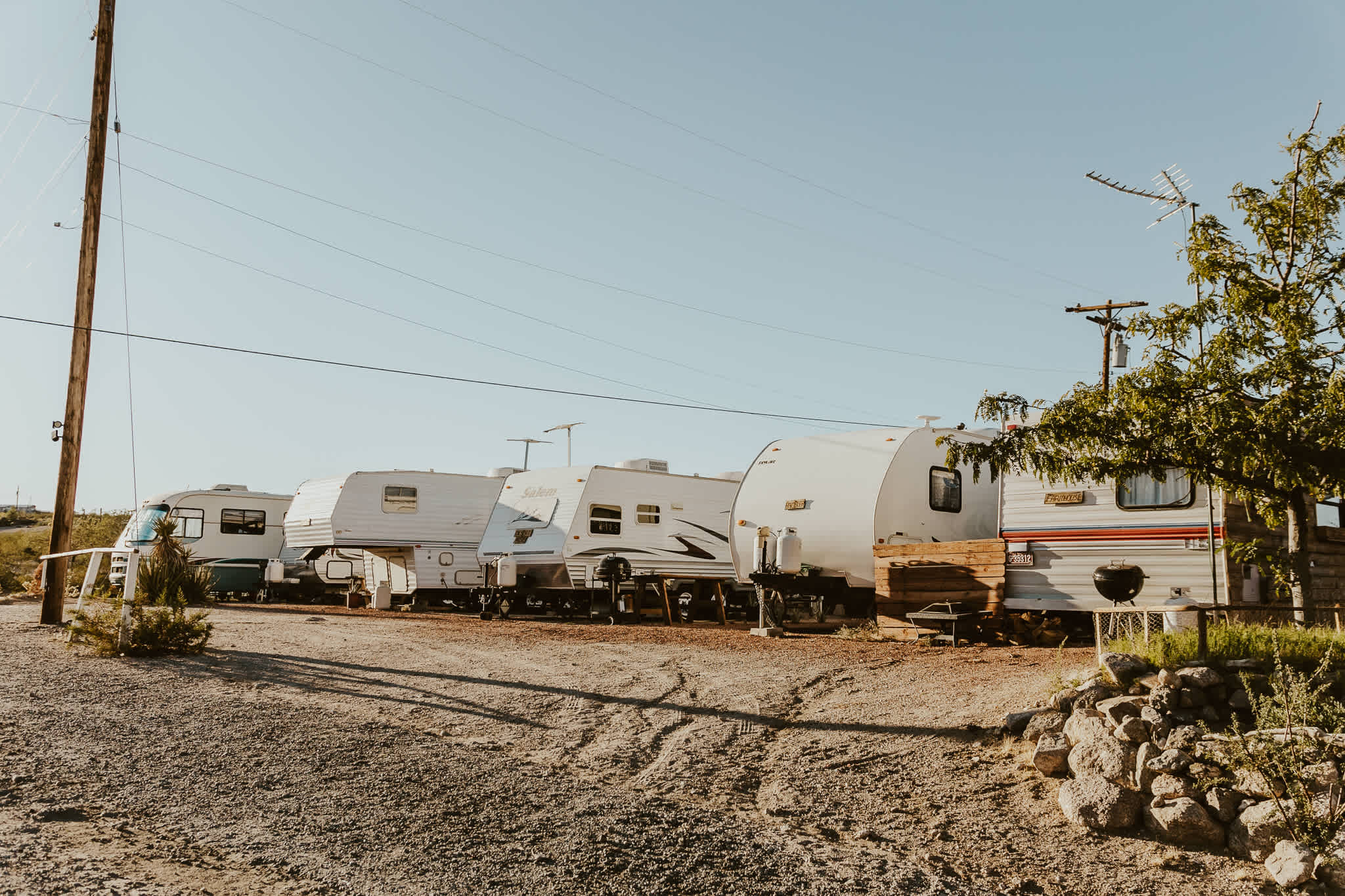 All of the glampers for rent are lined up next to each other on the property