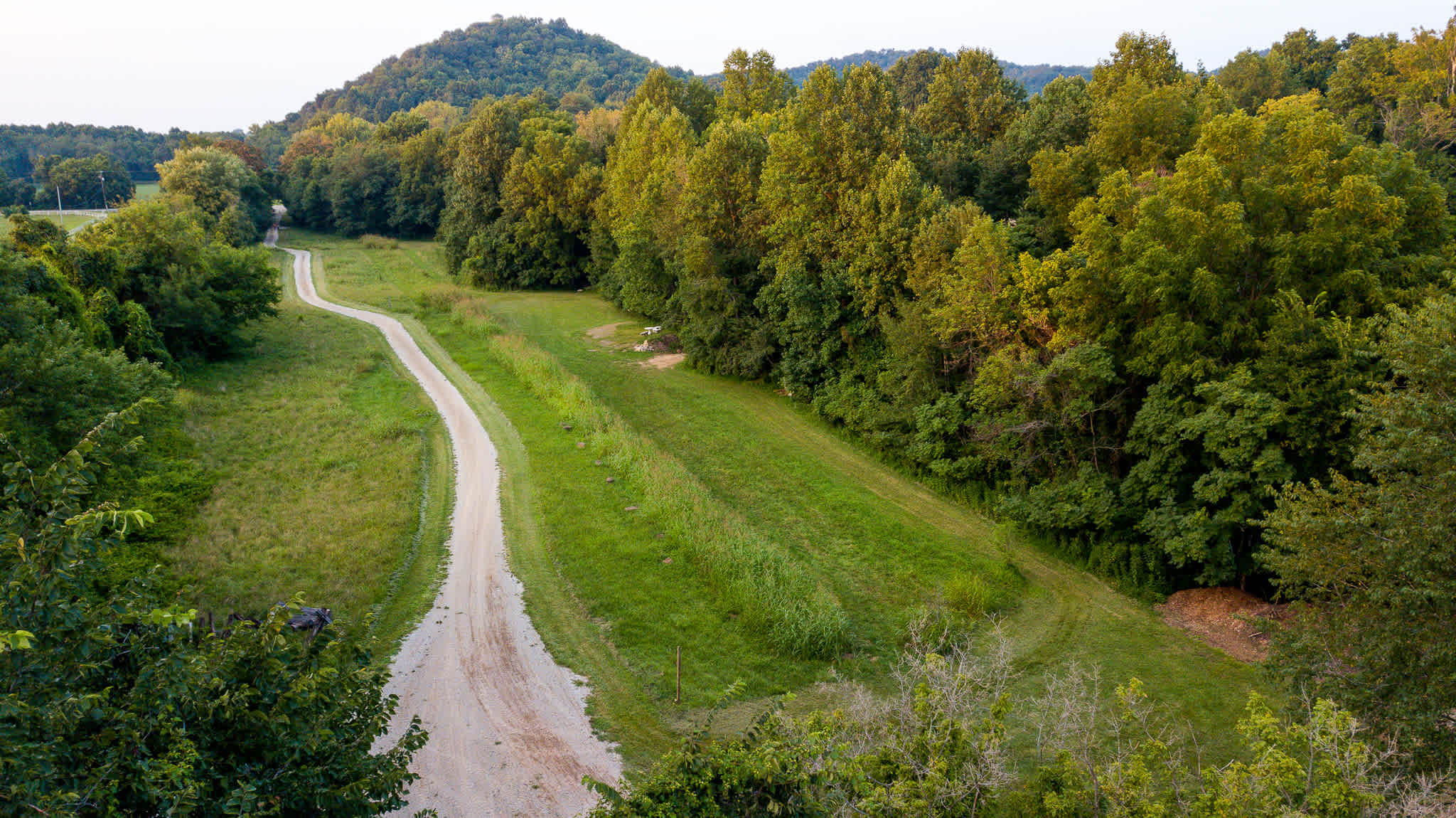 Aerial view of the 5 acre camping field from the back looking toward the entrance. 
