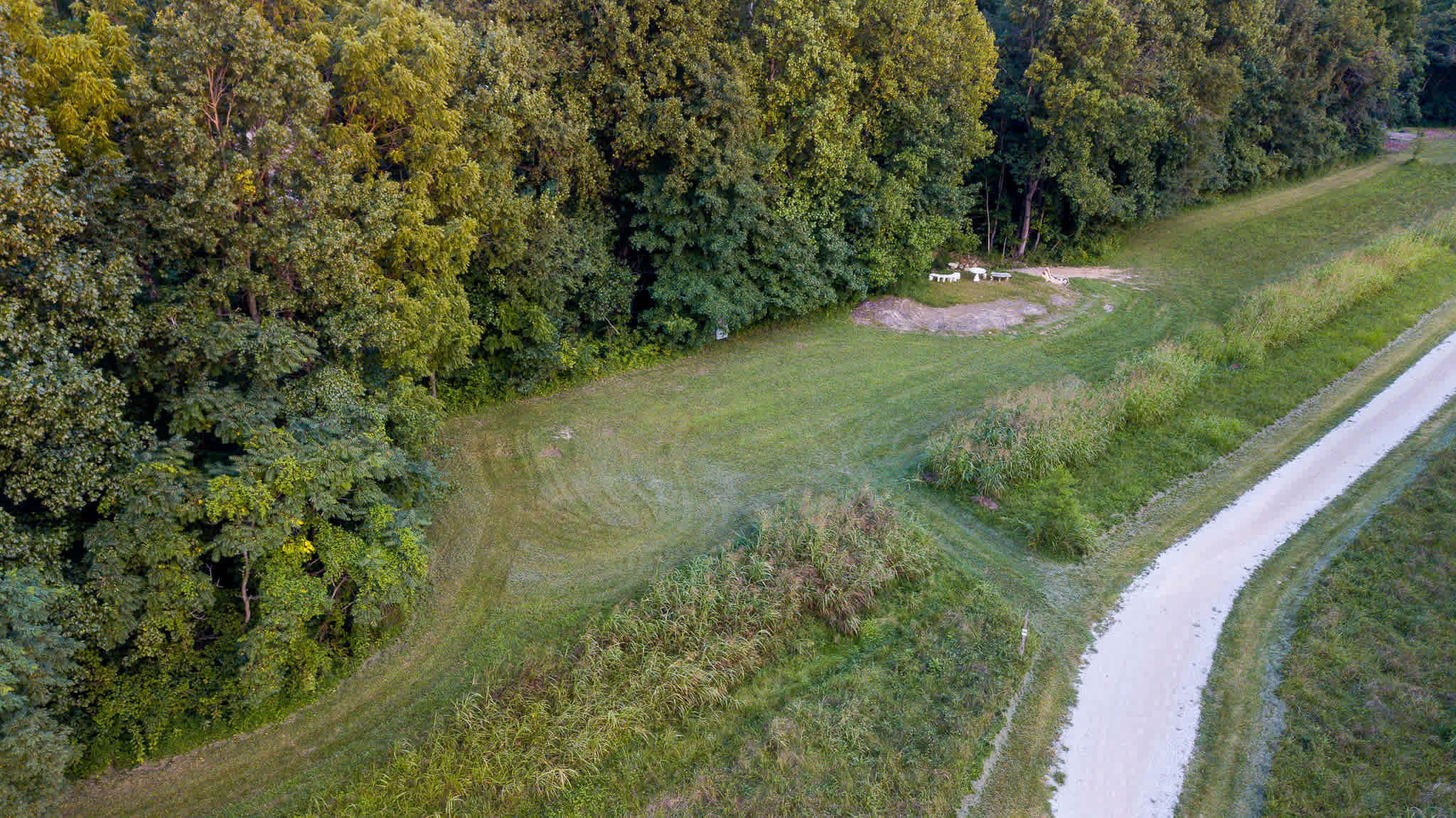 Aerial view of campsite number two with mowed grass entrance. This site is the closest to the bathroom and creek entrance.
