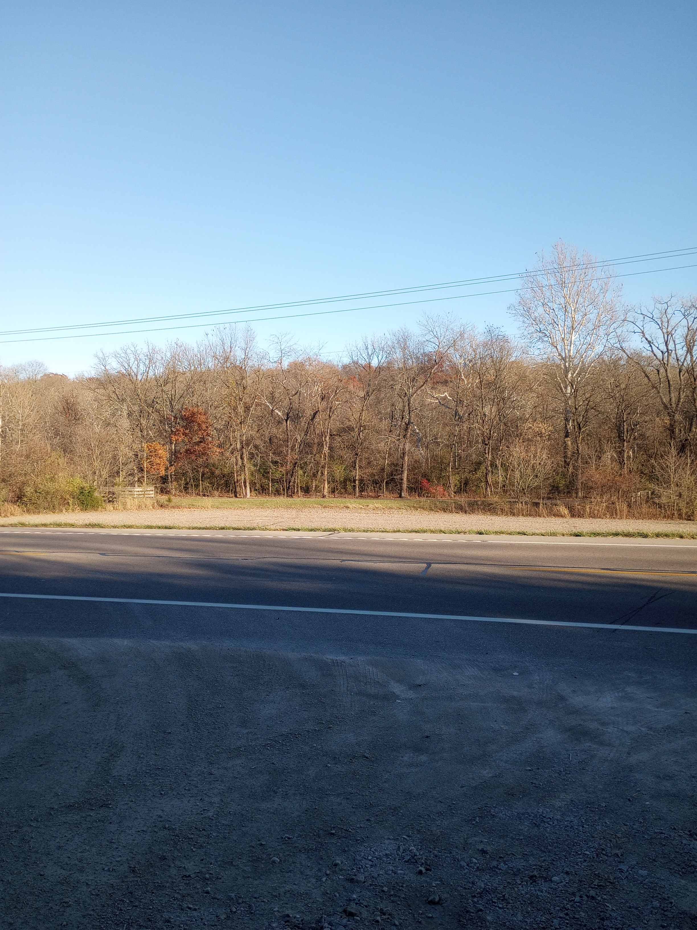 Across the street at the treeline is the Little Miami Scenic Trail.  I don't know if you can access it though.  Right across the street is a steep slope.