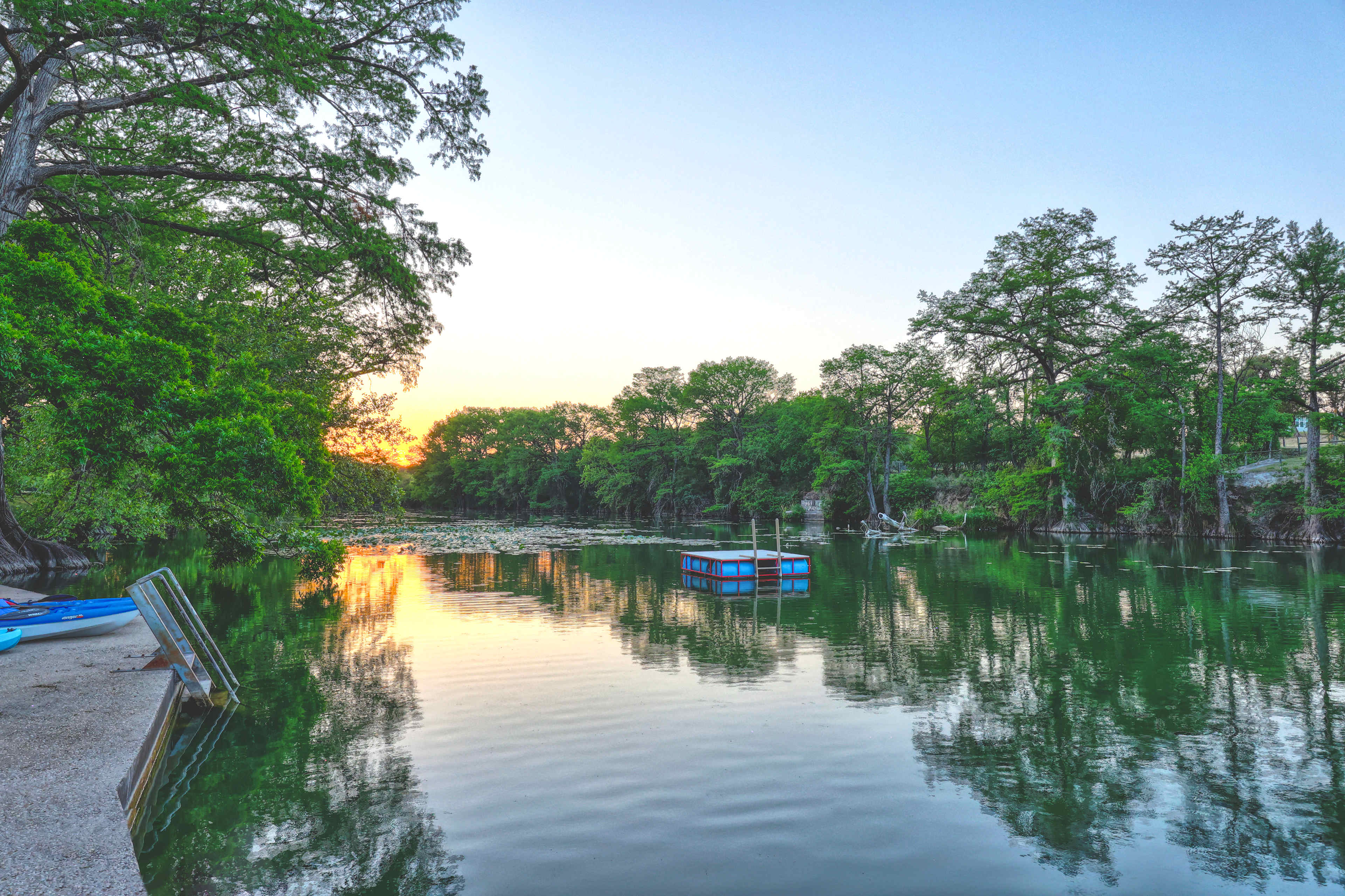 The Waltonia floating dock. Our section of the Guadalupe River is deep (about 6' at the riverfront). Great for fishing and swimming.