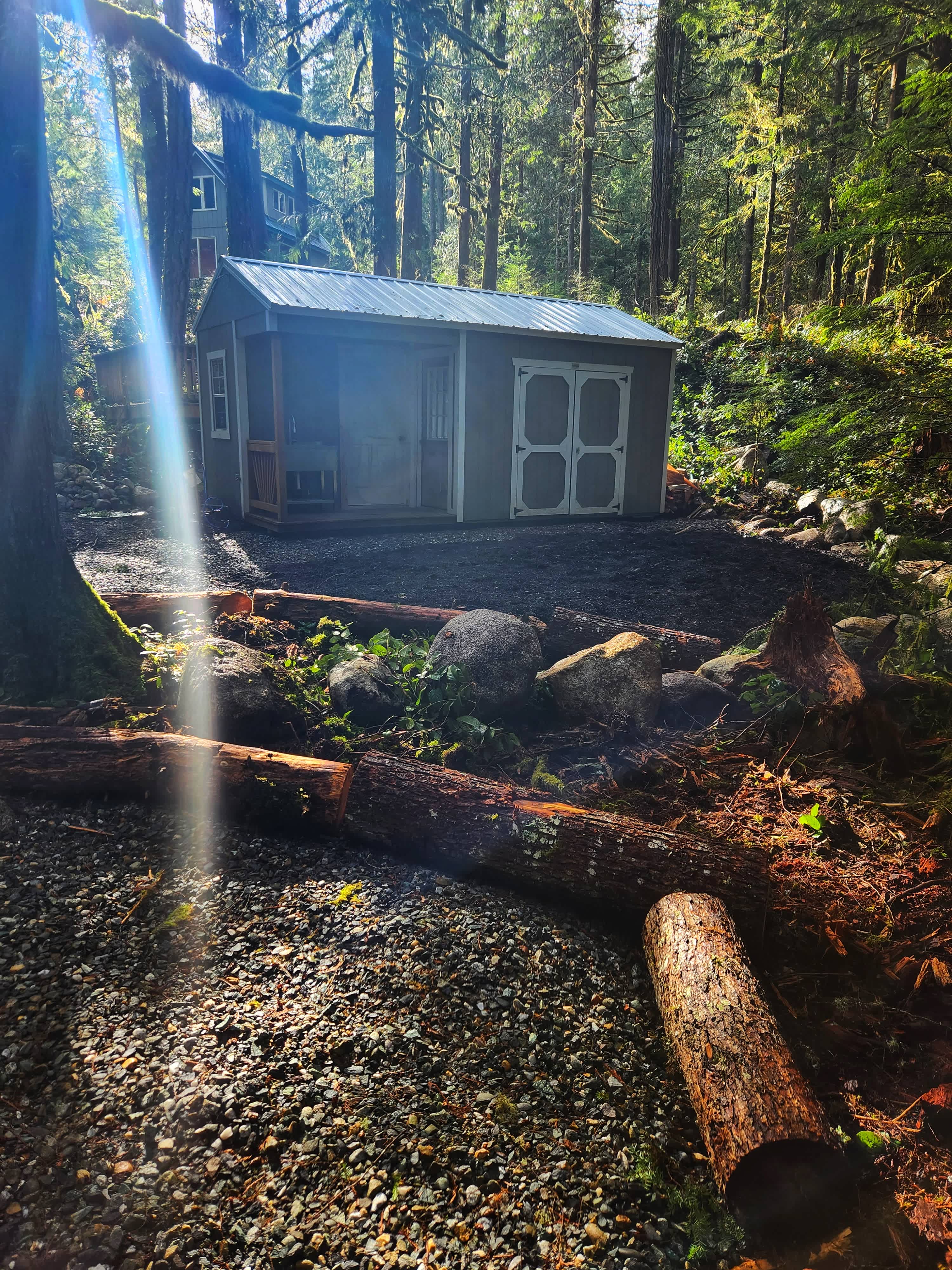 The tent pad is divided from the RV site