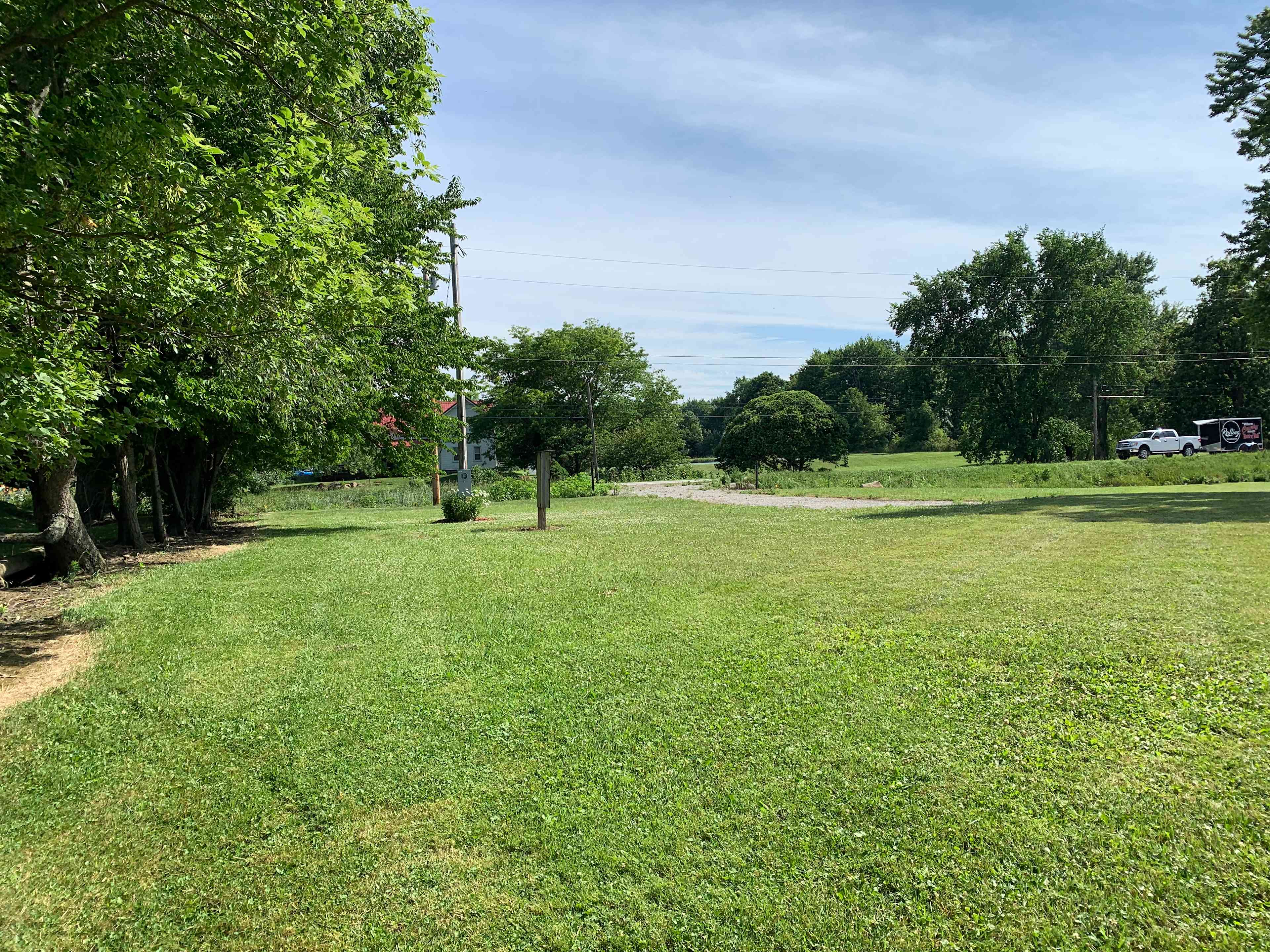Looking South towards the main highway with the camping site driveway. 