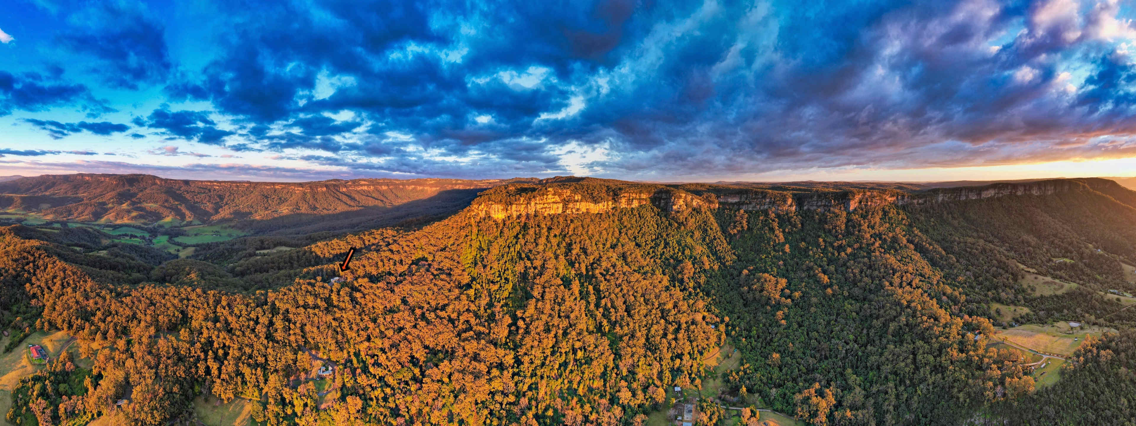 Look for the small orange arrow - it's pointing to the property which sits on a ridge line that leads right to the top of the escarpment.