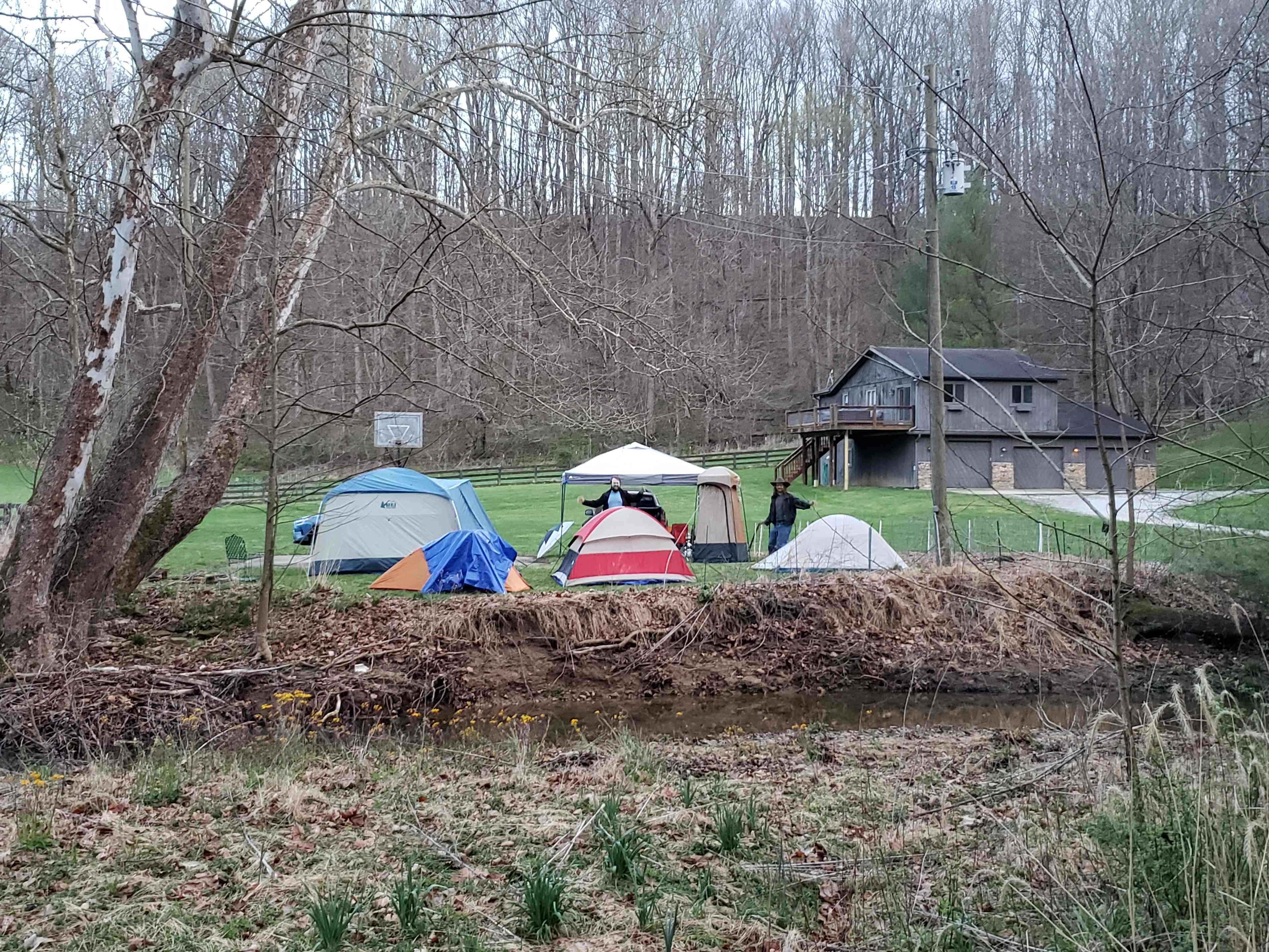 View of campsite with tents from opposite side of Kerr Creek