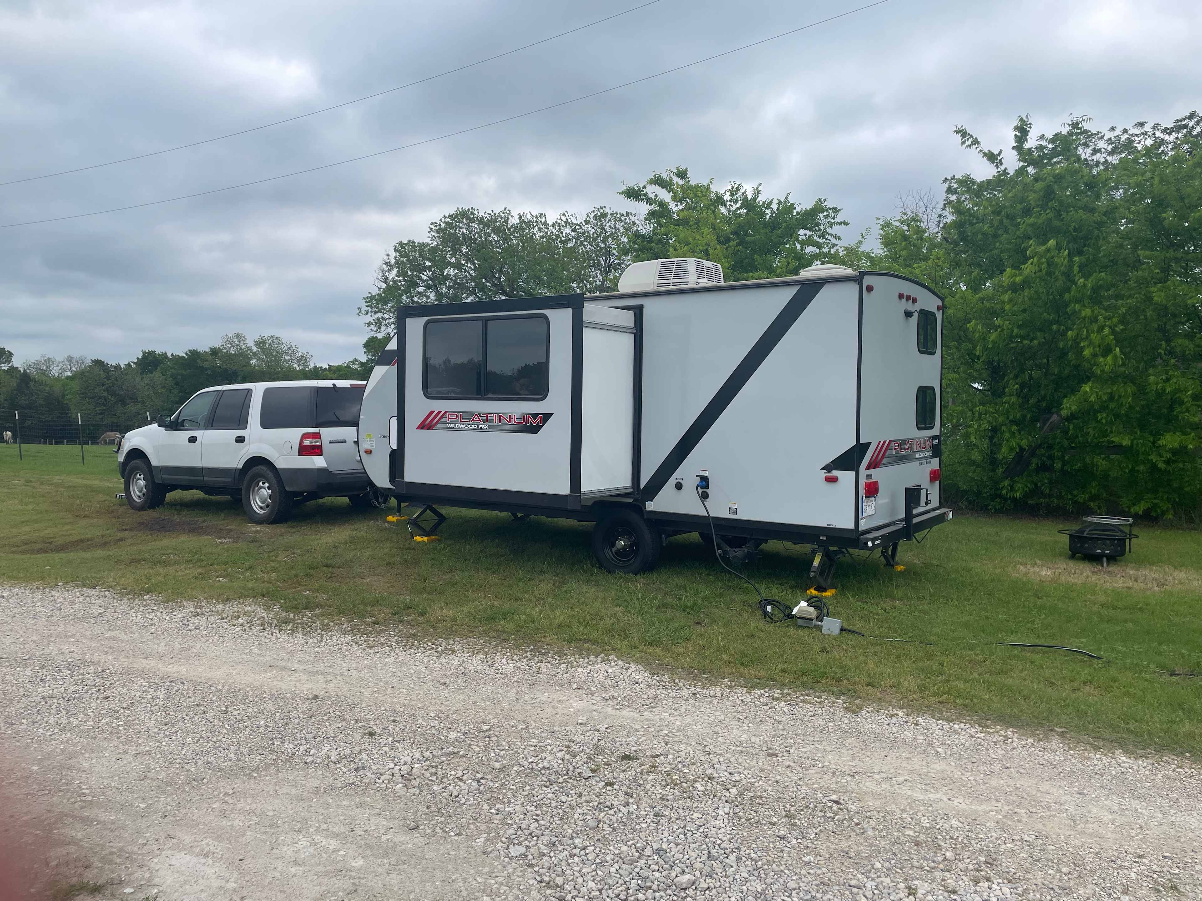 Easy pull in! Electrical connections and fire pit/grill too