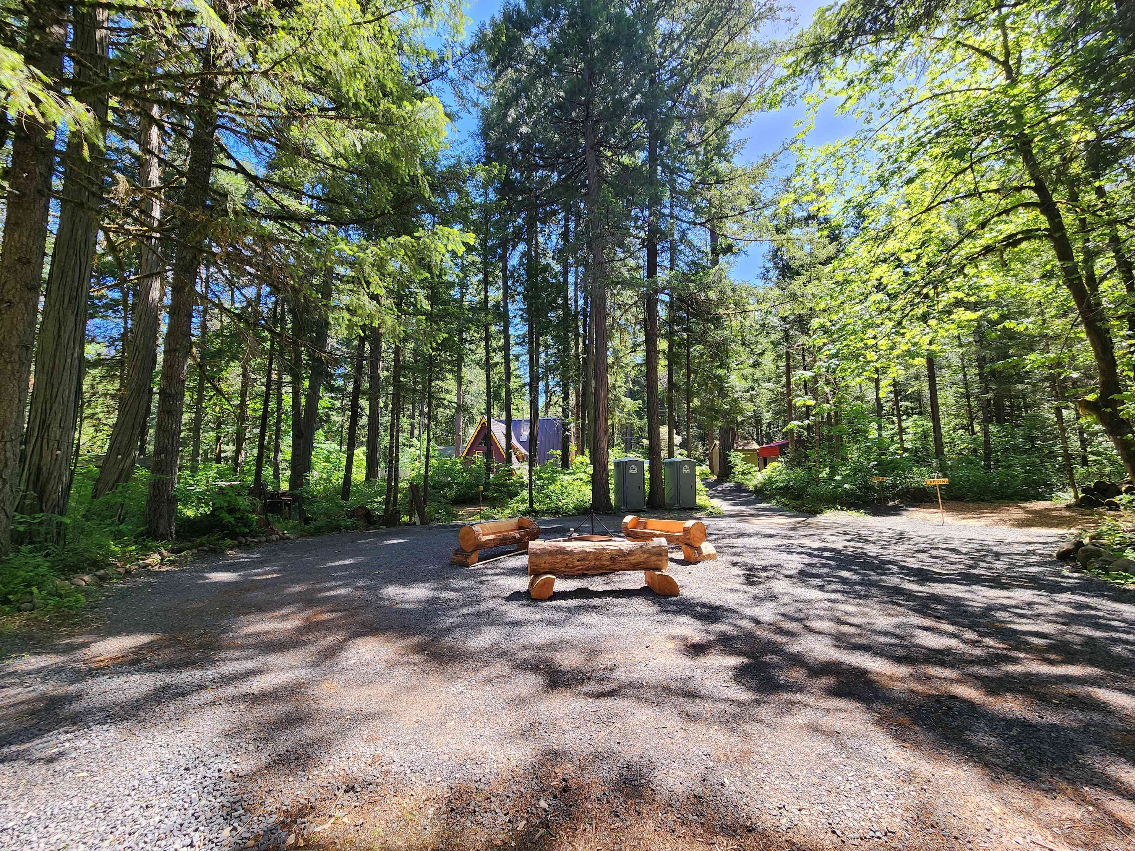 The heart of it all. The central gravel area with firepit and log benches. 
