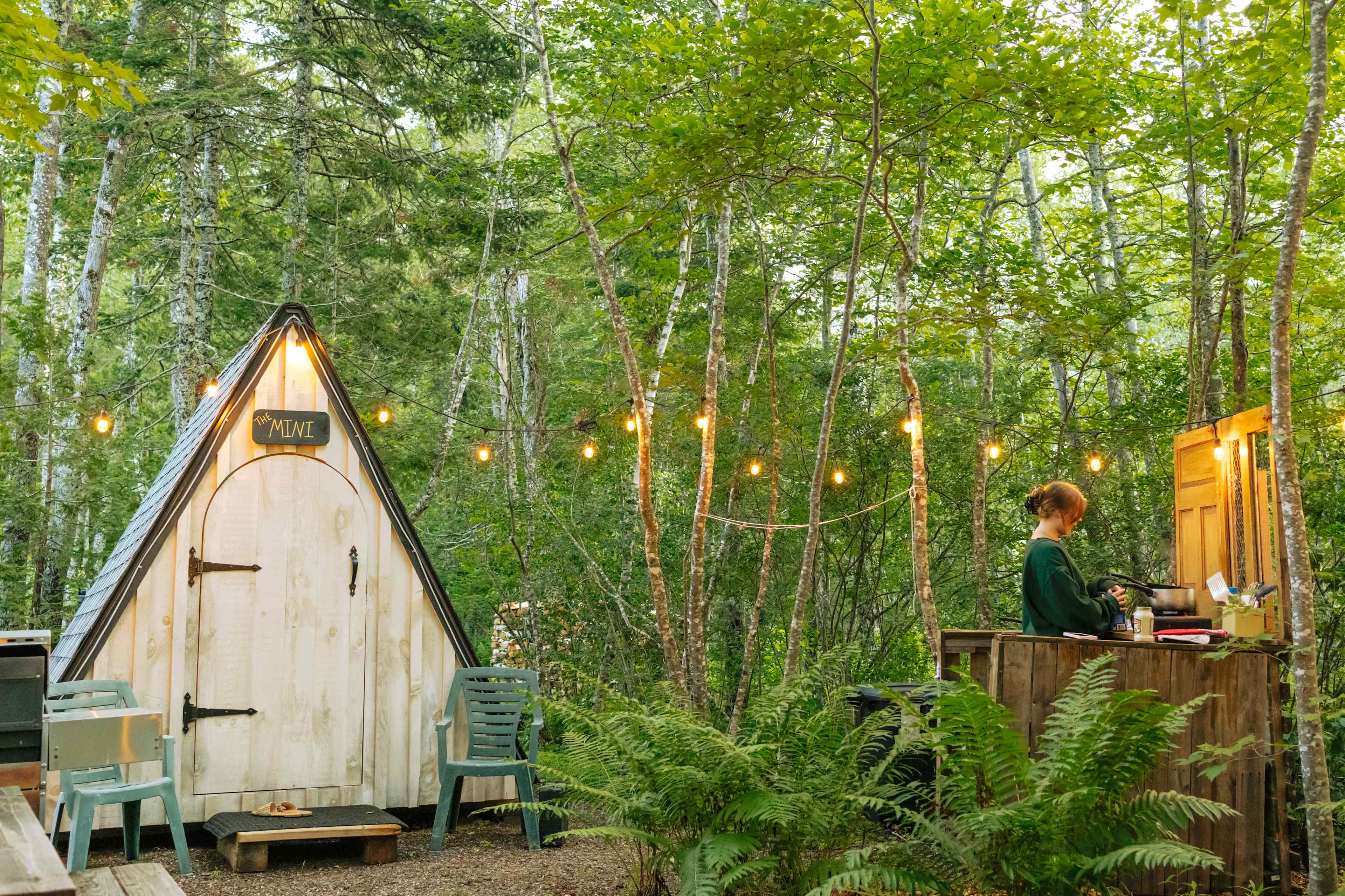 The Mini Lakeside A-Frame and its outdoor kitchen area.
