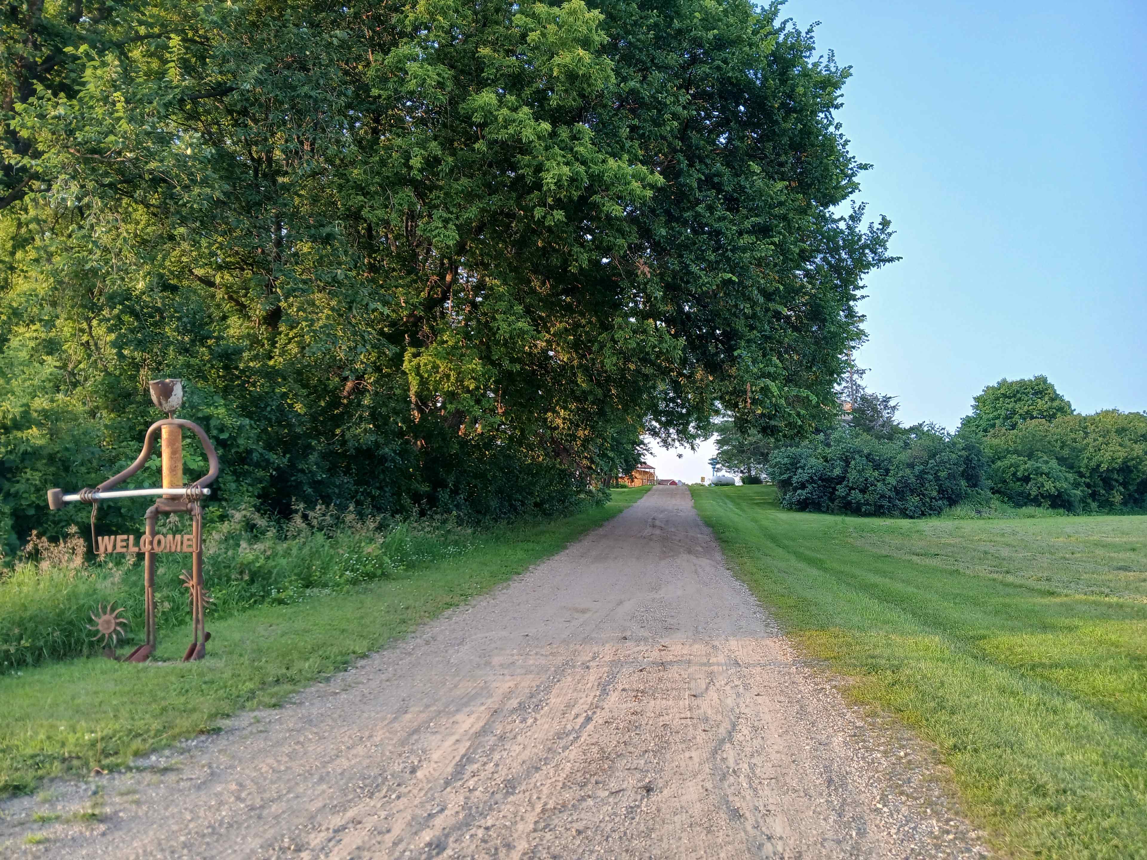 Welcome sign at the end of our driveway. 
Watch the fire number our gps dot is farther north than we are.