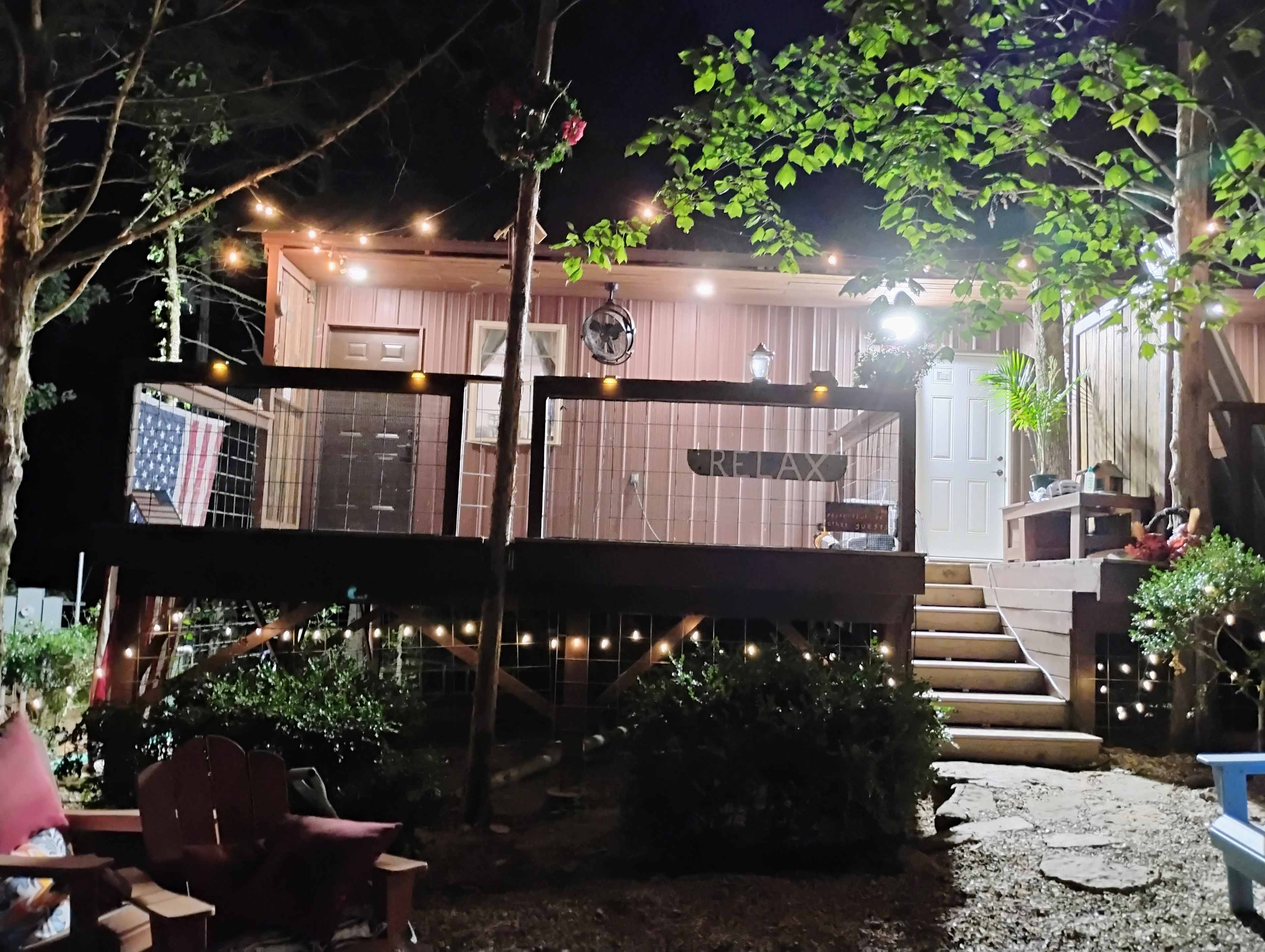 Entrance and front porch of the Bears Den cabin.