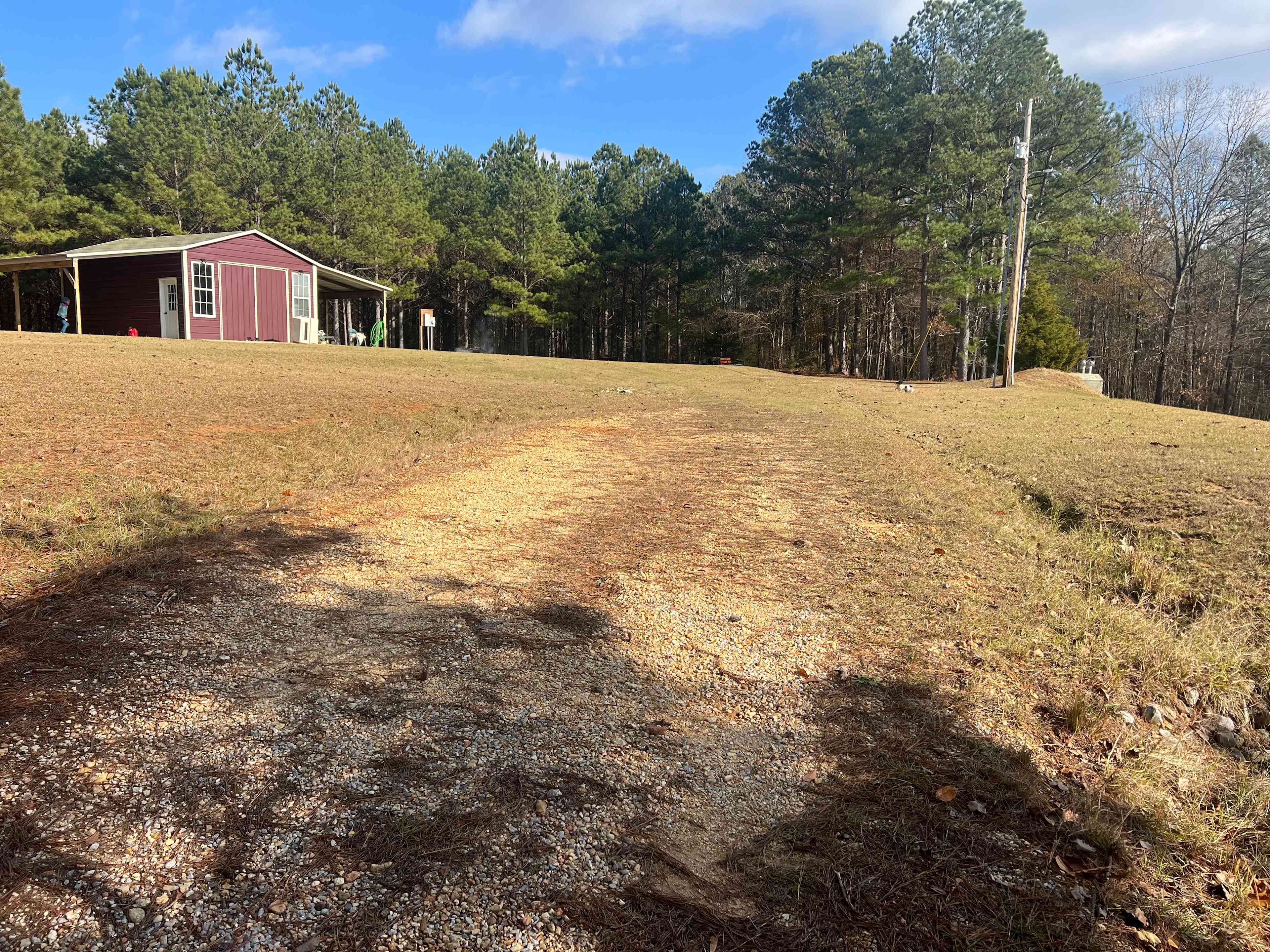 Site is located behind the barn