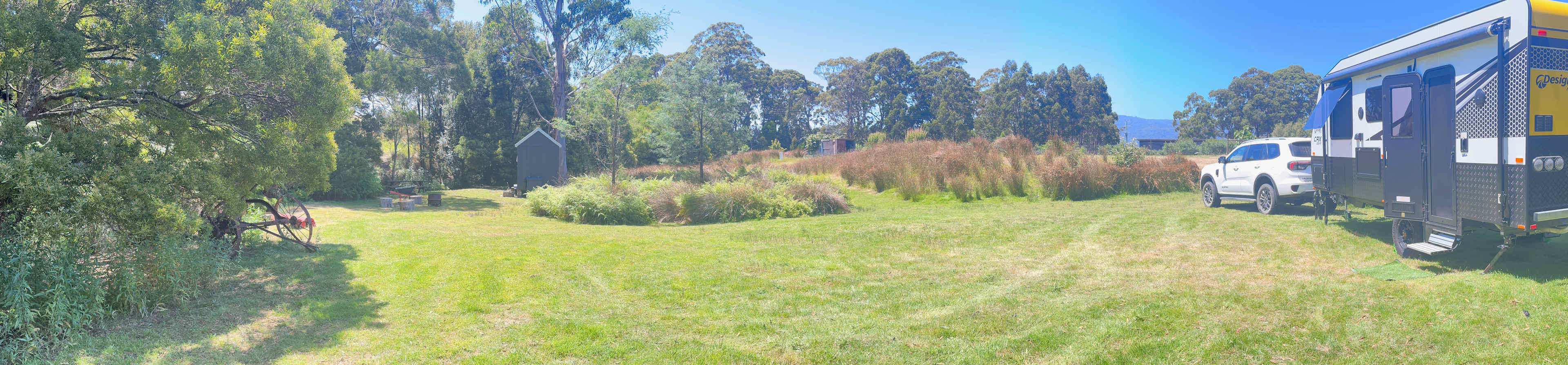 Easy access with a spacious and level grassy area, perfect for RVs and tents.