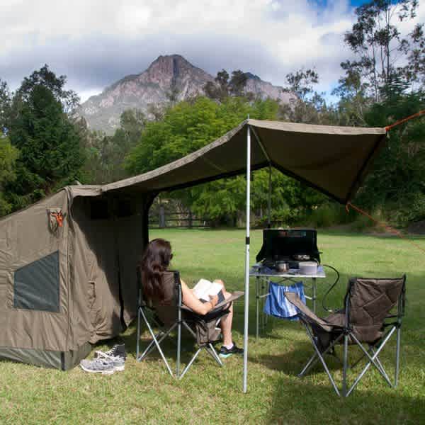 Choose your own grassy campsite with mountain views.
