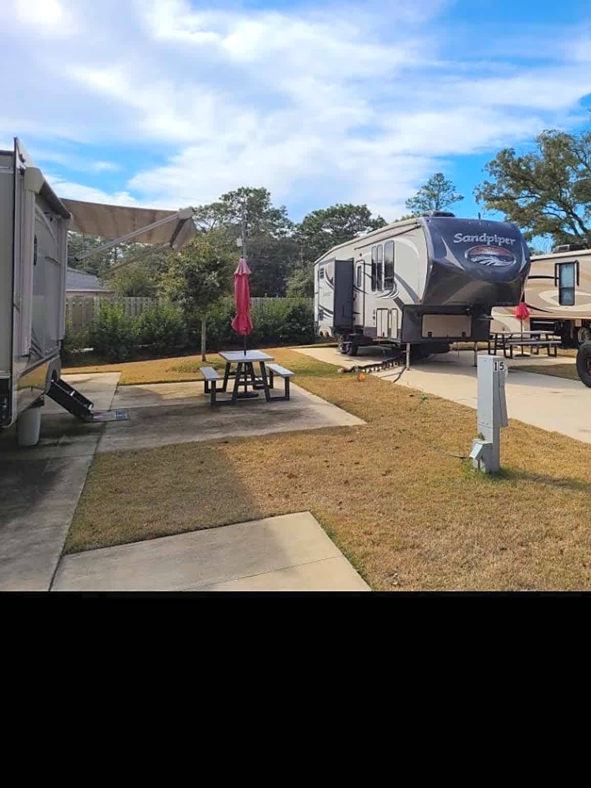Hybrid pull in/back in, All RVs (patio opposite side)