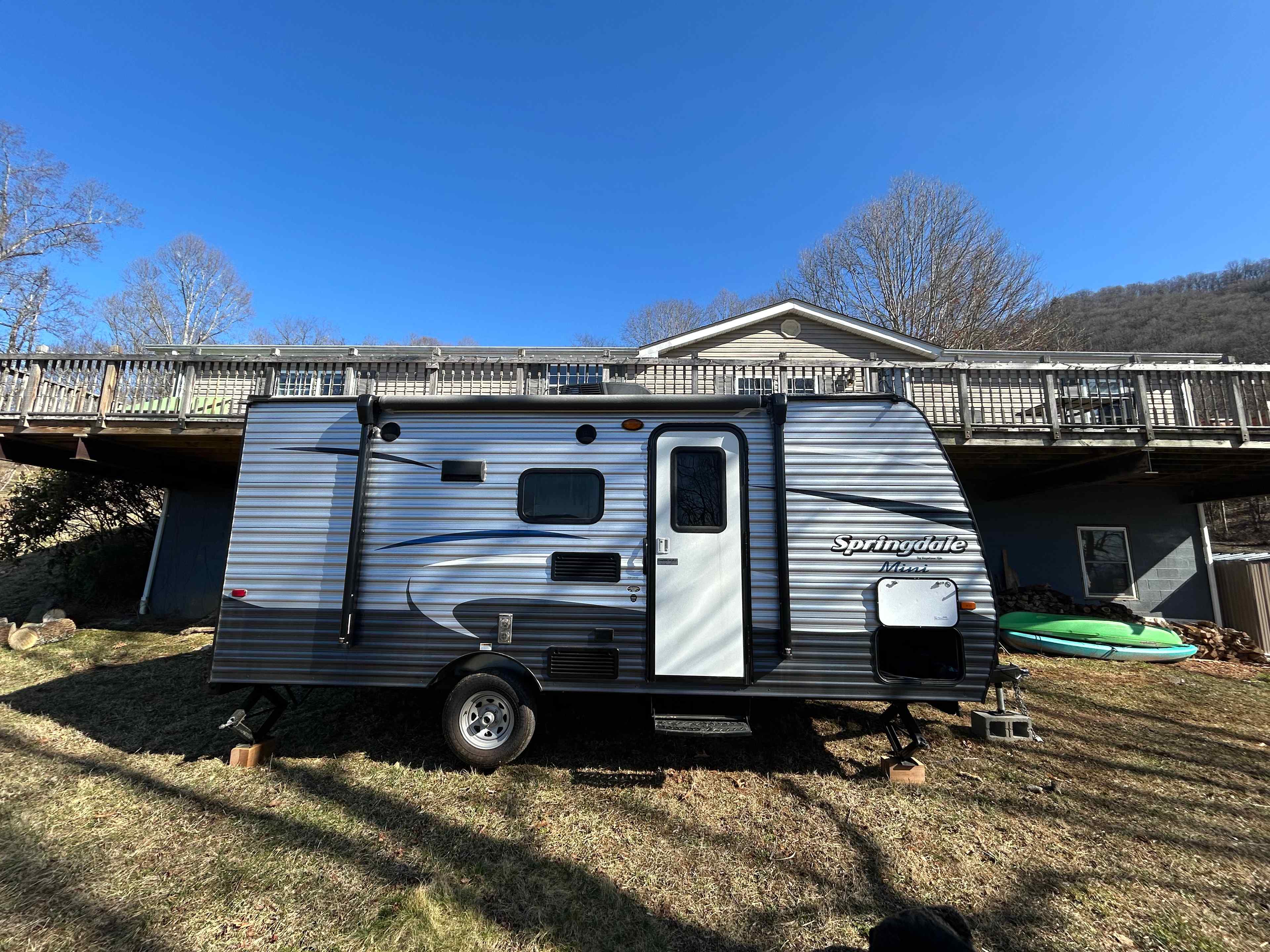 Camper is parked just below the house deck, which offers nearly 100% privacy.