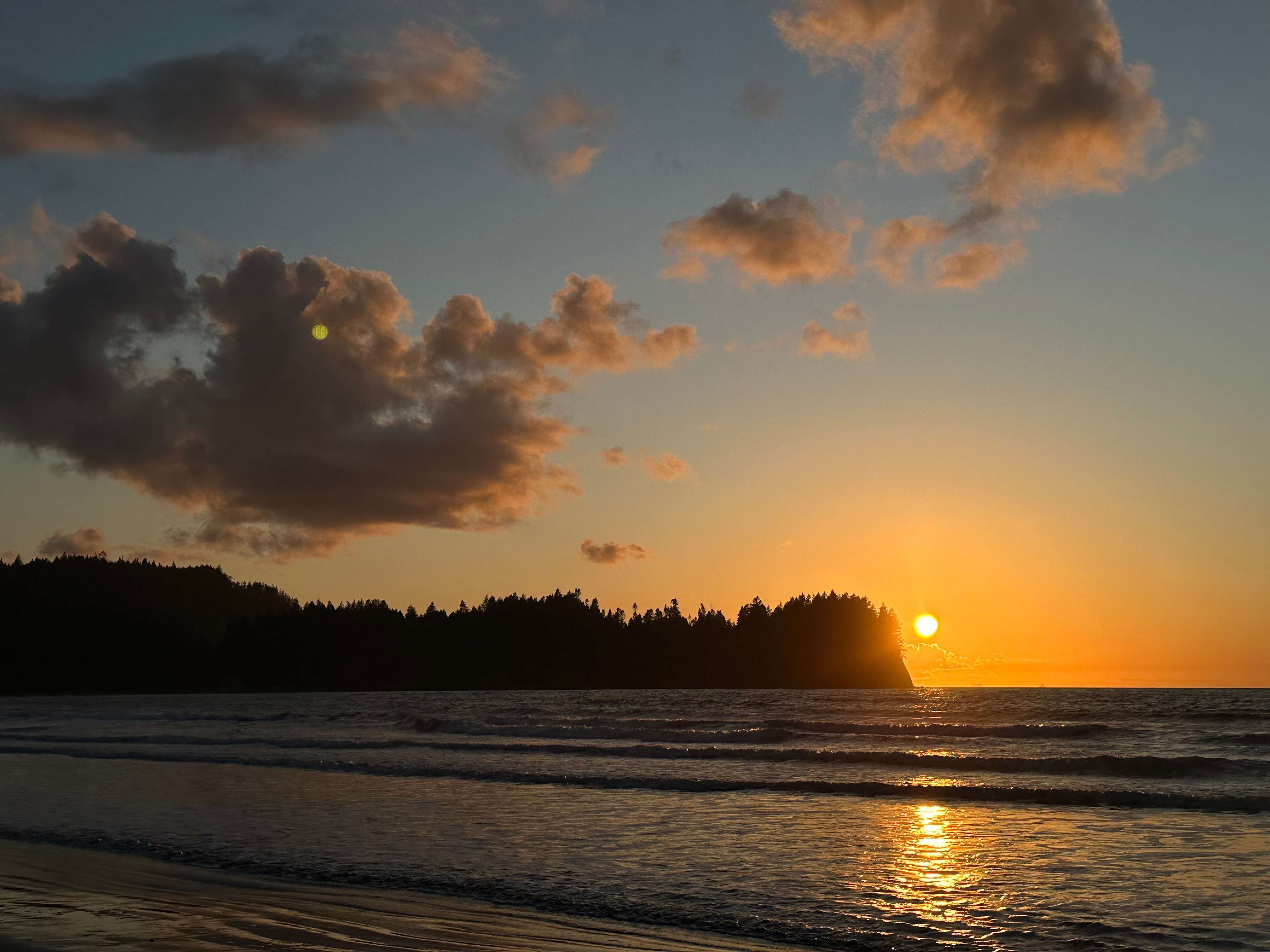 the campground’s beach at sunset