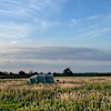 Tent pitch in peaceful meadow