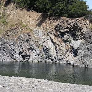 Incredible swimming hole. There is a beautiful (AND rocky) beach that spans the river and provides a great place to spend the afternoon picnicking. Swim across for a some sun bathing on the rocks of jumping off that high ledge (we witnessed some daredevils)