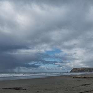 Looking north from beach to lighthouse.