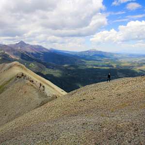 The rim of Gold King, the trail goes up the south wall.