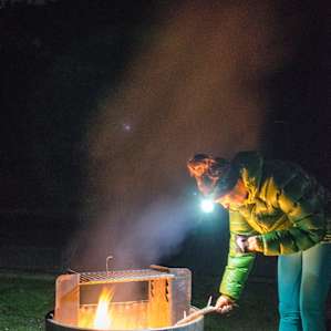 people campfire camper