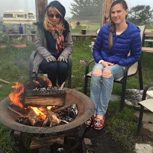 My mom and I enjoying the fire we finally managed to build