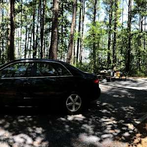 Pull up lot with the gravel pit, grill, and picnic table