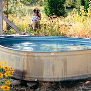The soaking tub, filled with spring water, is a great way to beat the afternoon heat.