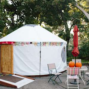 The outside canvas (and floor) of the yurt is repurposed billboard!