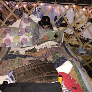 Inside the Yurt: great lighting and a comfortable bed!