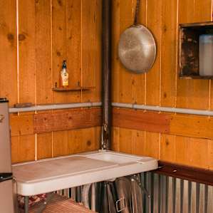 Utilitarian sink in the GREAT outdoor kitchen/hanging area. They have everything you'd need to prepare a feast. Just bring the food!