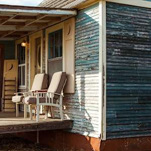 My favorite part of the house! The front porch was so comfy and had a beautiful view of the property.