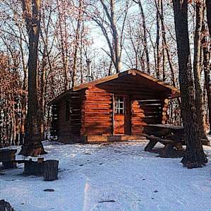 The cabin we stayed in had no running water or electricity but a wood stove to keep you warm and a latrine just up the hill !