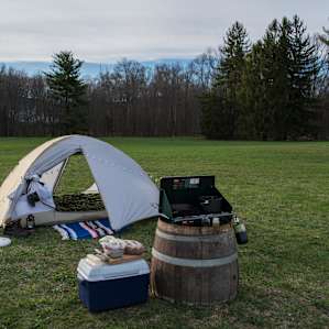 The wine barrel makes an excellent table for cooking camp meals.