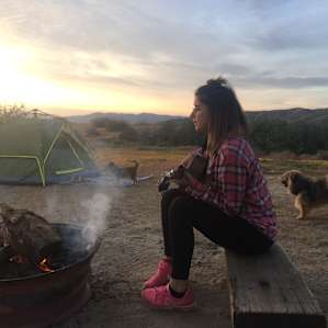 Playing some music by the fire.