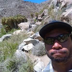 Hot and windy but there is an oasis with a waterfall at the end!