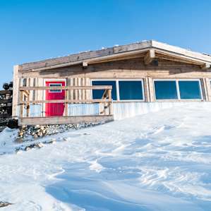 The front of the beautifully designed mountain hut.