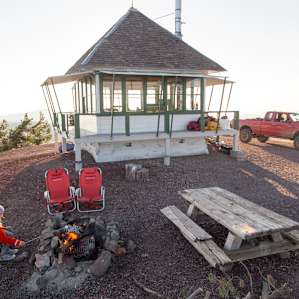cabin people campfire