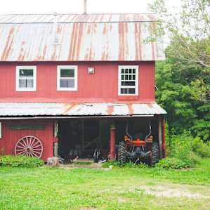 When you first pull in, you'll see this large red barn. Ring the bell and someone will come out to greet you!