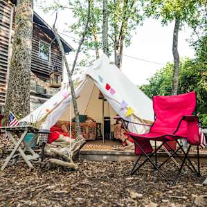 The tent opens up to a nice are on the river bank with plenty of seating.