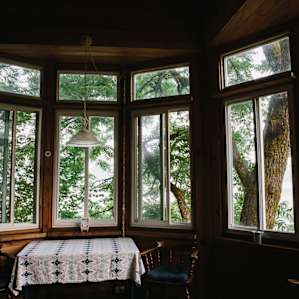 The surrounding trees hug the cabin making it feel as though you're in a tree house