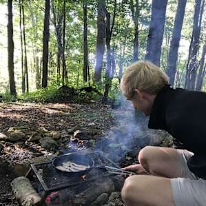 Nothing like bacon cooked over an open fire! The fire pit and provided grill rack were perfect for cooking our meals in the cast iron.
