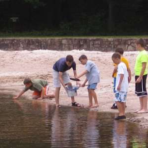 kids enjoyed catching salamanders in the lake