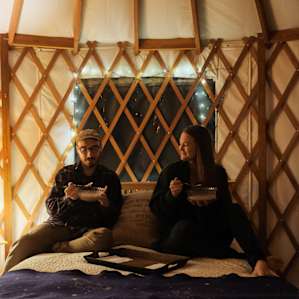 Sharing stories over dinner in the yurt.