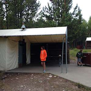 We stayed in one of the tent cabins. These feature interior wood burning stoves to help keep you warm at night! Worked quite well for my family.